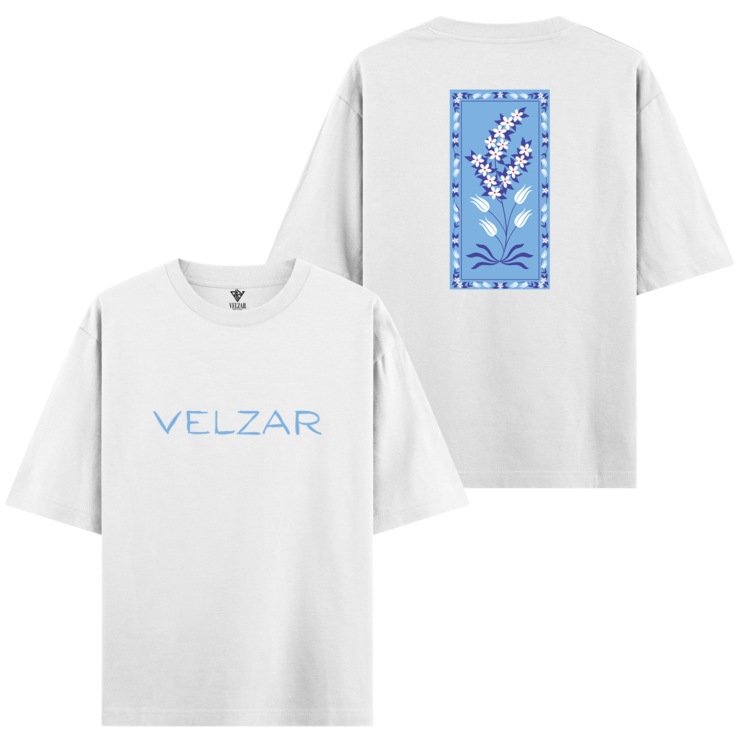 White t-shirt with 'VELZAR' branding on the front and floral design on the back.